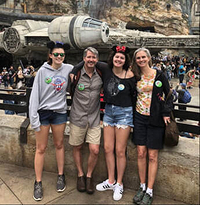 Suzanne Quinn and youth in a teen service volunteer program visit a Texas theme park.