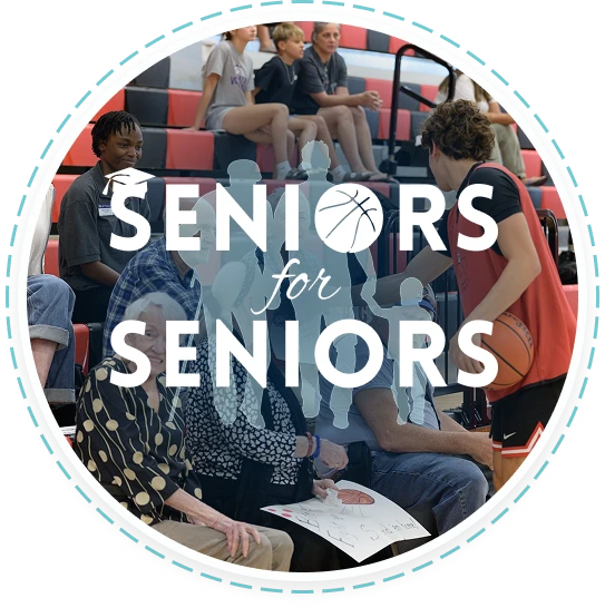 Teen basketball volunteer greets seniors in gym, promoting youth volunteering Texas programs.